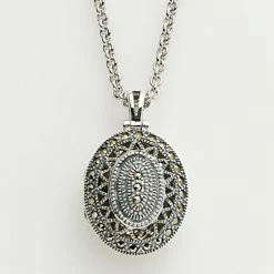 Lavish By TJM Sterling Silver Openwork Oval Locket